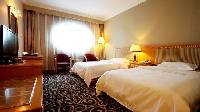 Modern Hotel Harbin Quarto foto